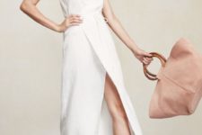 a minimalist whitw wrap midi dress with spaghetti straps, white sneakers and a blush tote bag