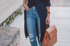 a navy midi shirtdress with short sleeves, blue jeans, tan lace up heels and a matching backpack plus a leather choker
