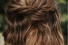 a simple half updo with twists and some waves down is a lovely idea for a lot of looks