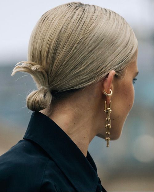 a sleek hairstyle with a low ponytail into a low bun is a very fast on the go hairstyle for short hair
