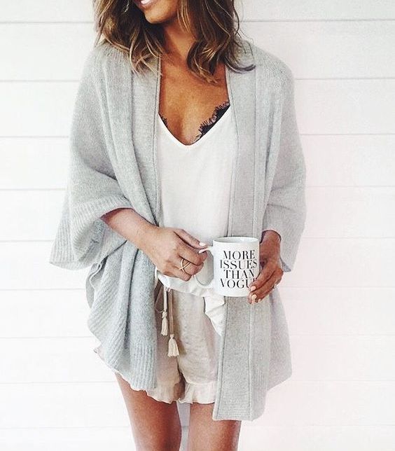 a white top, a black bralette, neutral shorts and a grey duster for a sexy and comfy look
