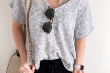 black joggers, a grey crochet oversized top and a grey lace bralette for a casual home look