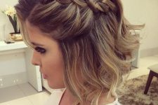wavy short hair with a large braid on one side for a chic lookat any party