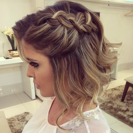 wavy short hair with a large braid on one side for a chic lookat any party