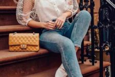 08 a stylish outfit with blue cropped skinnies, a white sheer sleeve blouse, white mules, a yellow bag