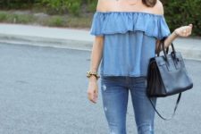 With cuffed jeans, black bag and beige pumps