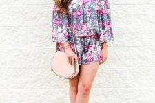 With floral off the shoulder romper and beige shoes