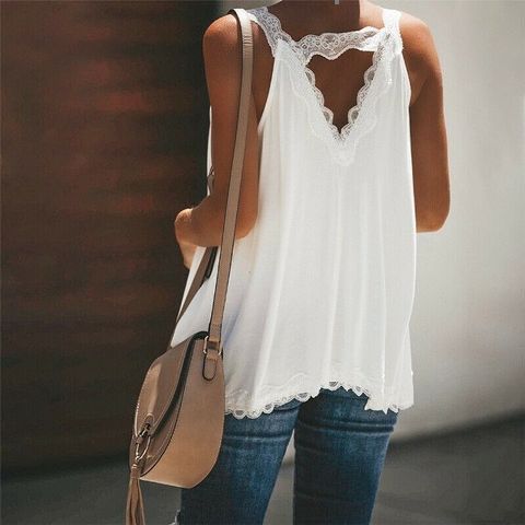 With jeans and beige bag
