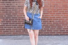With leopard printed shirt, chain strap bag and black boots