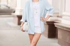 With white loose shirt, mini skirt, chain strap bag and white ankle strap high heels