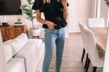 a black peplum top with short sleeves, blue skinnies, two tone slingbacks for a work look