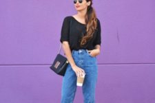 a black tee, blue cuffed jeans, black heeled mules and a black bag to wear every day