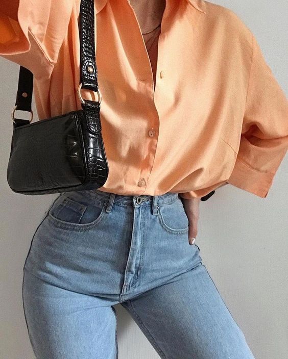 a bright spring look with an orange button down, blue jeans, a black baguette bag is amazing for every day