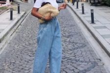 a casual look with a white tee, blue baggy jeans, two tone slingbacks and a wicker clutch for summer