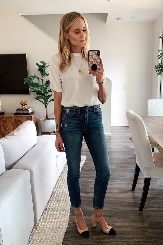 a casual look with a white tee, blue skinnies, two tone slingbacks and an accent necklace