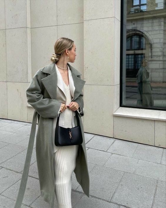 a creamy maxi dress, a blazer, a green grey midi coat, a black baguette bag are a chic look for many occasions