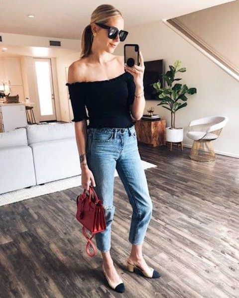 a date look with a black off the shoulder top, blue cropped skinnies, two tone slingbacks and a red bag