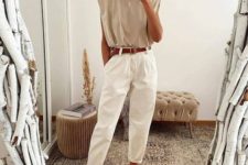 a fashionable summer outfit with a neutral padded shoulder tee, white pants, a brown belt and animal print shoes