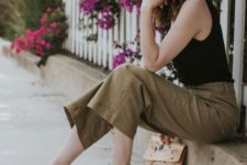 a summer look with a black top, tan cropped pants, black block heel sandals and trendy sunglasses