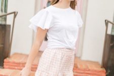 a summer look with a white ruffle sleeve top, pink plaid shorts, slippers and a small round bag