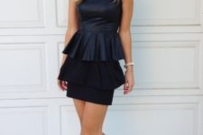 With black mini skirt and high heels