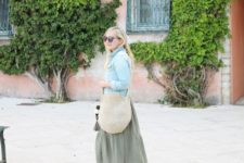 With denim jacket and olive green maxi dress