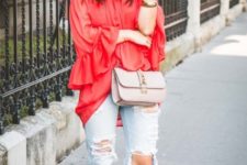 With distressed jeans, beige bag and beige lace up flat sandals