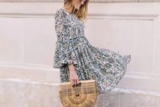 With floral ruffle mini dress and straw bag
