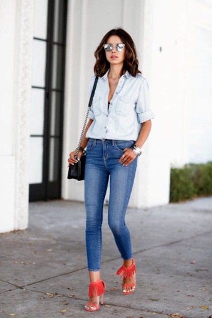 With light blue button down shirt, chain strap bag and skinny jeans