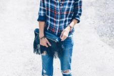 With plaid shirt, distressed jeans and marsala pumps