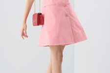 With red mini bag and pale pink pumps