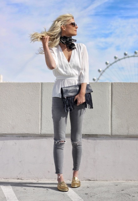 With white belted blouse, gray jeans and golden flat shoes
