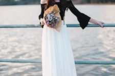 With white maxi skirt and black and white hat