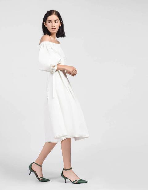 With white off the shoulder midi dress