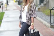 With white top, printed cardigan, skinny jeans and black tote bag