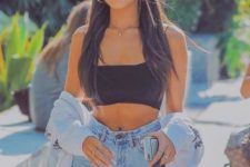 a black bra crop top, high waisted blue jeans, a hoodie with a zip for a flawless and sexy summer look
