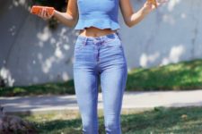 a blue crop top with a ruffle edge, blue skinnies, kitten heel mules by Kendall Jenner