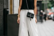 a monochromatic summer look with a black tank top, white culottes, black minimalist heels and a black bag
