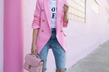 a printed white tee, blue ripped jeans, pink shoes, a hot pink blazer and a blush bag