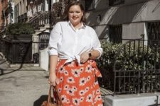 a white tied up shirt, an orange floral midi skirt, white sneakers and a brown tote for summer