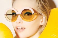 oversized retro-inspired round sunglasses in a thick colro block frame for a daring girl