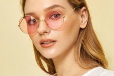 pastel pink round sunglasses ina  gold frame are elegant and retro-like, which is veyr hot for now