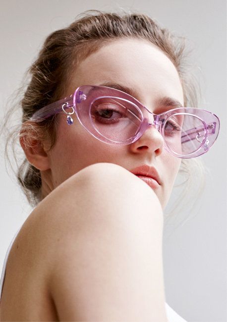 such clear purple sunglasses in a wide frame and cat eye shape will make a trendy statement in your look