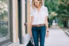 With cropped jeans, brown belt, black bag and black flats