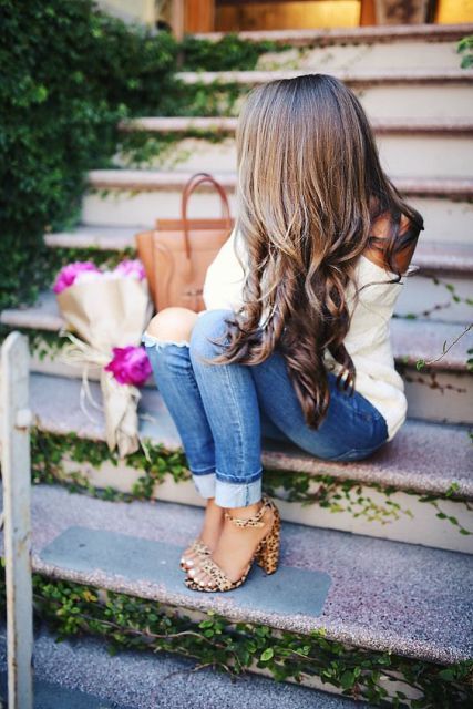 With distressed cuffed jeans, brown tote bag and white one shoulder shirt