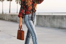 With floral blouse, brown leather bag and black boots