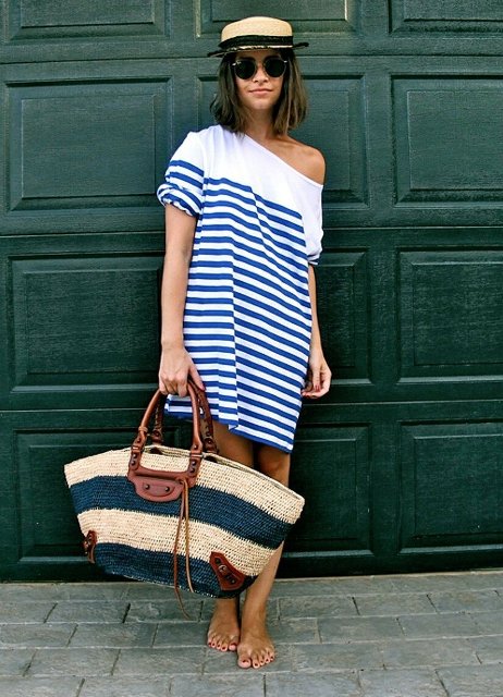 With hat and striped one shoulder dress