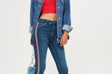 With red crop top, denim shirt, light blue bag and white shoes