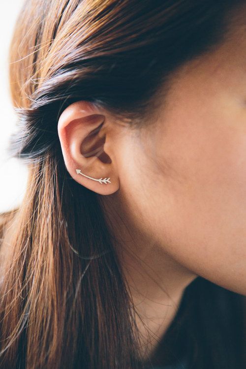 a curved arrow climber earring is a nice solution for a boho outfit and it looks fun