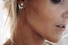 a gorgeous vintage-inspired crystal jacket earring looks statement, chic and refined